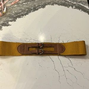 Gold and leather combination belt. X size 24. Material does not stretch. Cute!